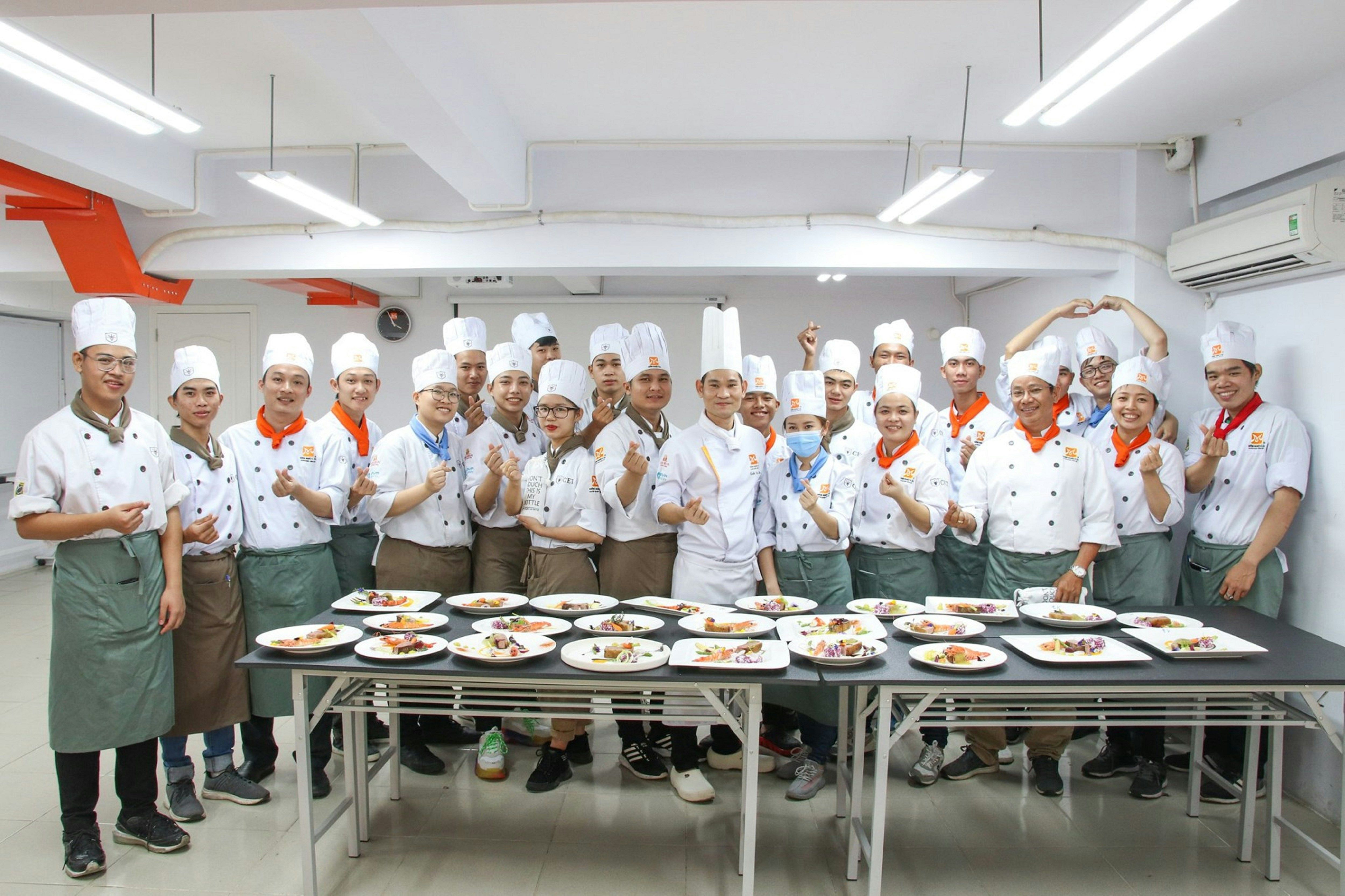 a group of chefs posing for a picture