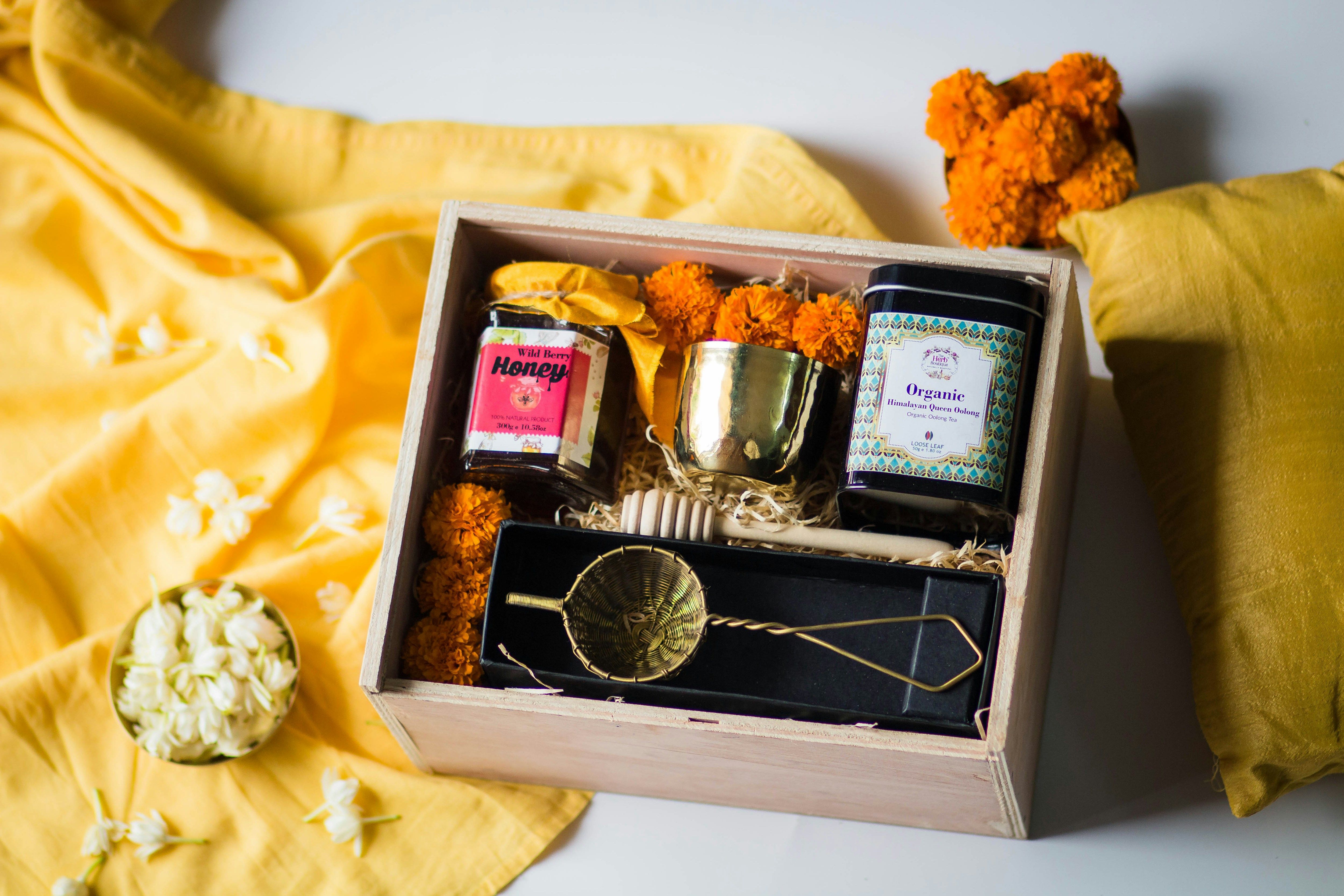 a wooden box filled with different types of items